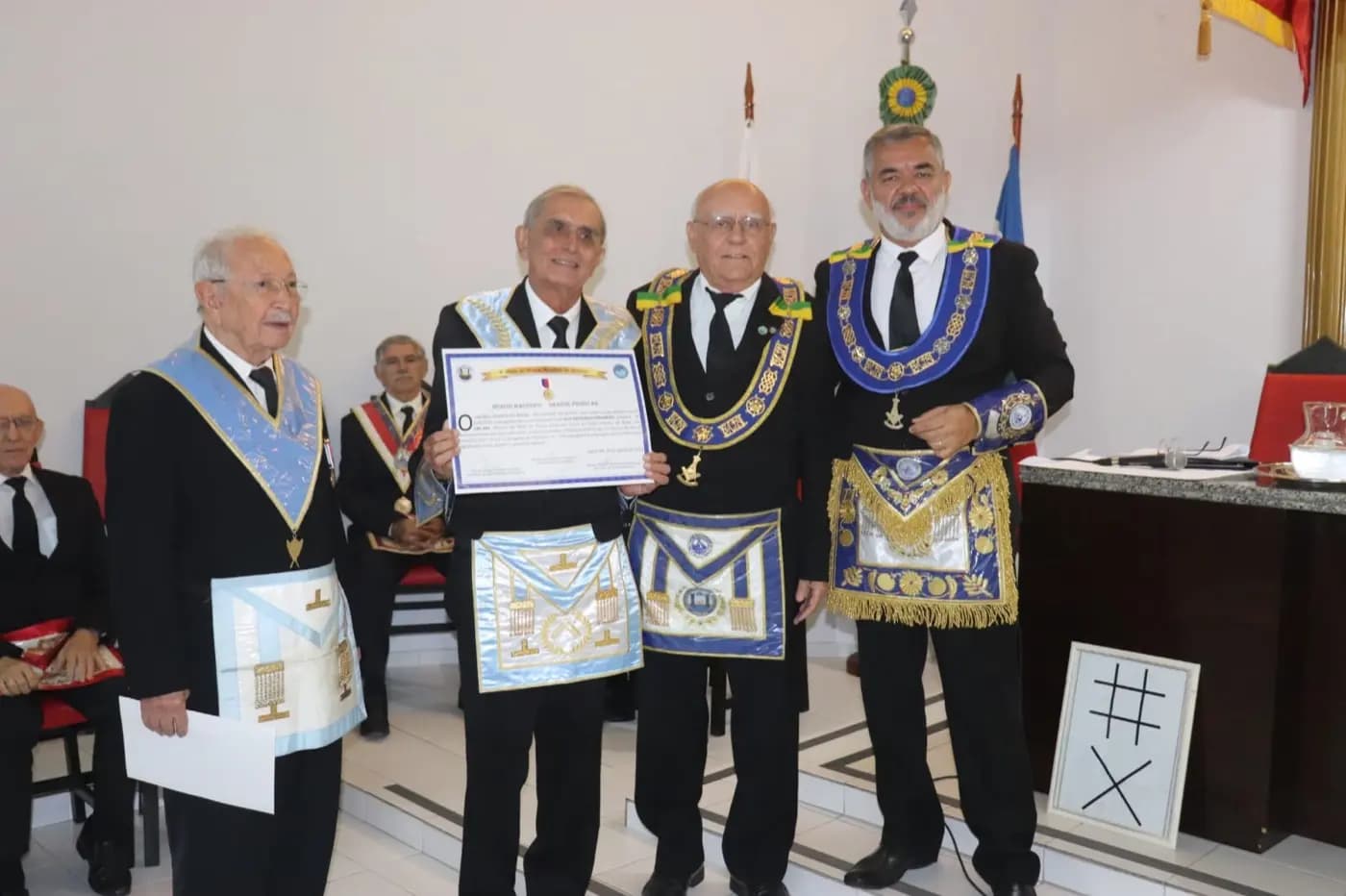 Registro fotográfico: PARTICIPAÇÃO DO GRÃO-MESTRE DO GOB/RN NA SESSÃO MAGNA PÚBLICA ALUSIVA AO 52º ANO DE FUNDAÇÃO DA LOJA MAÇÔNICA DR. PEDRO GERMANO COSTA N° 2.349, ORIENTE DE NATAL/RN.